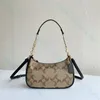 Topquality underarmsäckar kvinnors män designers totes crossbody lyxdesigner mode handväskor utskrift axelpåsar koppling totes hobo purses plånbok grossist