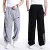 Erkekler pantolon sokak kıyafetleri 2023 Sonbahar bahar pamuk gevşek adam harem erkek eşofman hip hop pantolonlar erkek artı boyutu giyim parkur
