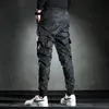 Pantaloni maschili uomini uomini mimetizzati elasticità pantaloni cargo militari che colano a più tasche pantaloni da jogger casual 230811