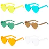 Sonnenbrille Outdoor Heart Randless für Frauen geformte Brille trendy Pfirsich transparente Bonbon -Farb -Objektivparty Gunst