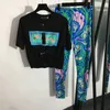 Modetryck kvinnor skjorta leggings korta ärm t skjortor smala passform byxor sexiga toppar högkvalitativa tees byxor set