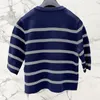 Kvinnors stickor 2023 Runway Wool Blend Half Sleeve tröja Kvinnor Fashion O-Neck Single Breasted Stripe Cardigan Female Elegant Knitwear Tops