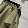 Spódnice wczesna wiosna boczna część Lotus liść pół spódnicy metalowa klamra ta tkanina armia zielona design klasyczny wysoki talia