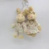 Plush Keychains 2pc schattige Bunny Plush Doll Floral Burlap Teddy Bear Keychain Girl Kawaii Animal Gevulde speelgoed paar sleutelhanger hanger hoge kwaliteit 230811