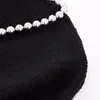 Kvinnors stickor hösten 2023 unika stickade retro retro casual v-ringade pärlor korta bowknot dekorativ tröja kofta