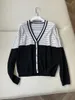 Kvinnors stickor svartvit färgblock stickad Cardigan V-halsversion Micro-Cutout Design Casual Fashion 2023 Summer 0312