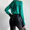 Kvinnors polos bär 2023 sexig V-ringning långärmad bodysuit axel pad casual topp för kvinnor