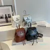 Sac à bandoulière en gros pour dames 4 couleurs Personnalité Silver Loison Sac à dos Couleur de couleur Couleur en cuir Small Flip