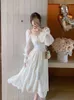 Casual klänningar elegant vit klänning kvinnor söt fairy midi långärmad ihålig ut rygglös semester sundress sommarchiffong