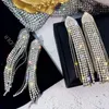 Hänge halsband klassiska glänsande kristallörhängen damer överdrivna långa örhängen tofsar örhängen mode koreanska örhängen smycken 230811