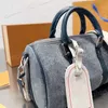 Saco de ombro azul de jeans lavável Bolsa de ombro de couro genuíno Top Tote Bacs de qualidade Designer de luxo Tootes travesseiros Bolsas de festa Boston Bolsas de festa