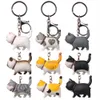 Keychains Lonyards auto-guérison chaude série de chats japonais clés rond roulant simple chat à la main la version coréenne