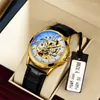 Armbandsur Autentisk fullautomatisk rörelse Watch in the Counter Men's Double-Sided Hollow Out Trend High-End Business Luminous