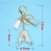 Keychains Lanyards 26 Engelska Alfabetet Keychain Tassel Fashion Pendant Accessoarer Stone Gold Foil Harts Key Ring Enkelt för män och kvinnor