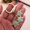 Keychains Lanyards New Fashion Maple Leaf Keychain Enamel Plant Key Rings for Women Men Handbag Pendants DIY Jewelry Crafts Accessories
