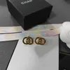 Charm designer Grandma Xiang's New Gold Solid School Bag Button Earrings C Family 925 Silver Needle 1MW4 TC3N