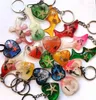 Keychains yqtdmy 12 pcs design mixte mode étoile de mer les spécimens d'insectif