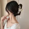 フラワーバタフライタッセルヘアクリップウォームラインストーンパールヘアクローズガールズエレガンスヴィンテージヘッドドレスヘアアクセス