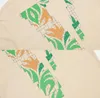 デザイナーメンズフレンズ-Tシャツ有名なブランドTシャツビッグVヒップホップ男性女性断片化されたパズルレターロゴTシャツユニセックスルースショートリーブティートップス衣類プルオーバー