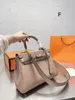 Lyxdesigner Elis New Cowhide Epsom läder axel crossbody väska Klassisk tryckt bokstäver för kvinnor mångsidig kvinnors minihandväska