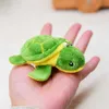 Anahtarlıklar kornonlar kaplumbağa peluş anahtarlık doldurulmuş hayvan yumuşak kürk sevimli yeşil cazibe aksesuarları anahtarlama sırt çantası için dekoratif oyuncak
