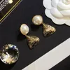 Designer Charm Boucles d'oreilles boucles d'oreille boucle Drop Fashion Femmes Inlass Crystal Pearl en acier inoxydable Gol Silver plaqué de mode Bijoux de mariage