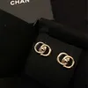 Charm designer Grandma Xiang's New Gold Solid School Bag Button Earrings C Family 925 Silver Needle 1MW4 TC3N