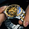 Armbandsur Autentisk fullautomatisk rörelse Watch in the Counter Men's Double-Sided Hollow Out Trend High-End Business Luminous