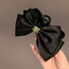 Hårklämmor Barrettes Designer Stor Bow Knot Hårnål Högkvalitet Satin Finish Exquisite Shark Clip Back Spoon Elegant Pan Jewelry NB9X