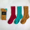 Skarpetki projektanckie Y2K Skarpetki średnie rurki bawełniane skarpetki modne Skarpetki Casual Skarpetki uliczne w stylu Multi-Style Colorful Para Socks 03