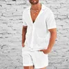 Suits de survêtement masculins 2 pièces 2023 Summer Tracksuit Men Sexy Mesh Voir à travers un haut à manches courtes et un short convient à l'homme des tenues de correspondance décontractées