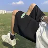 Shorts masculinos de letra americana impressão de verão esportes de rua de rua