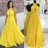 Modest Chiffon Yellow Long Evening Dresses Halter Pleated Flowy golvlängd Backless Prom Dress Billiga formella festklänningar1782