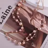 Pendellankette Europa und die USA Retro -Größe allmählicher Veränderung Pearl Long Double Layer Mode Halskette Frau