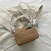 Bolsas de praia para a praia deste ano e gentil Bolsa plissada primavera e verão 2022 nova bolsa de ombro de palha de palha para MulherstylishDesignerbags