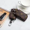 Designer Men Universal Car Key Bags Case Unisex Manlig äkta Leather Key's Holder Women Zipper Smart KeyChain Case Cars Keys Pouch Bag Plånbok