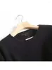 Panks de femmes Yenkye Femmes Black Loose Casual Knit Sweater O Coule à manches longues Piloulurs féminins