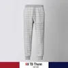 Pantalon en jacquard écossais Tb Thonn avec différents sens de conception pour hommes et femmes, sport décontracté