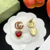 Women Designer Double g Stud Luxury Geometric Crystal Heart-shaped Couple Earrings For Lady Party hot Golden good