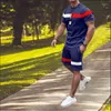 Suits-survêtement masculins Fashion Summer Half-Marsed Shorts Twip Opting Spelling Stripe Collision Collision Décoration T-shirt Round Neck