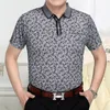 メンズポロス2023サマーファッションカジュアルルーズで快適な服特大のトレンディなコントラストカラー印刷されたラペルポロシャツ