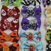 Dog Apparel 100PCS Halloween Dog Bows Pet Hair Bows For Small Dog Cat Skull Pumpkin Style Bows Rubber Bands For Dogs Hair Accessories 230812