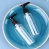 Lagringsflaskor 4 st små glas emulsion flaskelotion pump makeup rese containrar schampo dispenser clear tank
