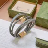 23ss fashion Chain jewelry Woven leather hand rope for women and men Metal guitar decoration Leather bracelet Including box Couple Gift