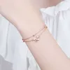 Le nouveau bracelet à arc en argent sterling de la tendance S925 pour le sens avancé des femmes, le luxe léger et la conception du petit marché, l'artisanat à double couche, le cadeau étudiant