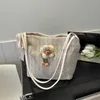 Sacs de plage Sac de grande capacité de fleur tissée de l'herbe pour les femmes 2023 Nouvelle mode à main une épaule à la mode fille de banlieue baguette bagstylishdesignerbags