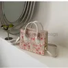 Strandtassen Koreaanse versie Getextureerde kant bloemtas voor damestas Nieuwe zomer 2022 Girls Crossbody tas modieuze draagbare kleine vierkante bagstylishdesigner bags