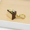 Chaines Glaçage en gros Glaze Chocolate Triangle Cake Pendant Fleur Sandwich Sac Keetchain Sac Accessoires pour femmes