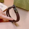 23ss fashion Chain jewelry Woven leather hand rope for women and men Metal guitar decoration Leather bracelet Including box Couple Gift