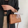 Plaj çantaları kadın çantası yeni batı trend dokuma keten el omuz çanta küçük taze zincir moda crossbody bagstylishdesignerbags